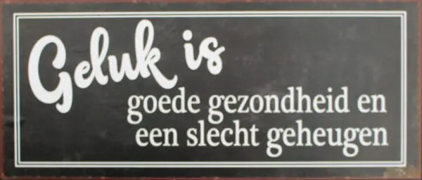Tekstbord: "Geluk is goede gezondheid en een slecht geheugen"