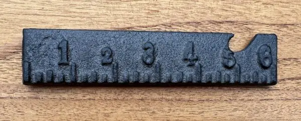 Flesopener, bieropener meetlint, liniaal, gietijzer FG582
