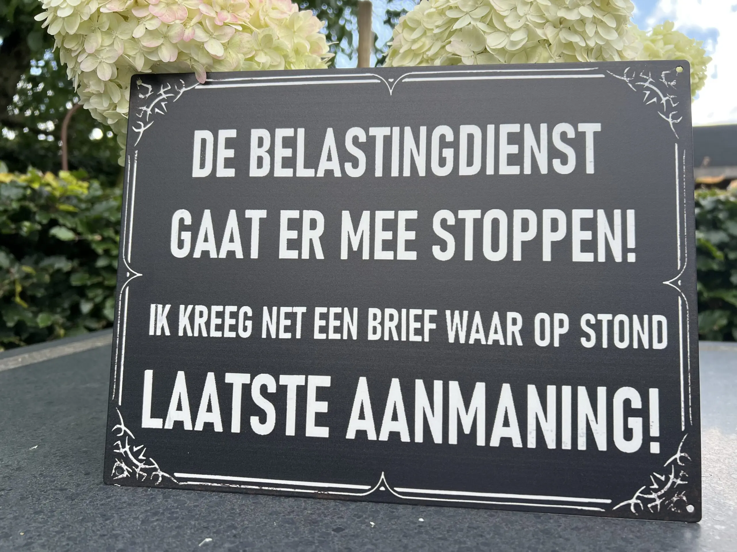 Tekstbord: De belastingdienst gaat er mee stoppen! TB458